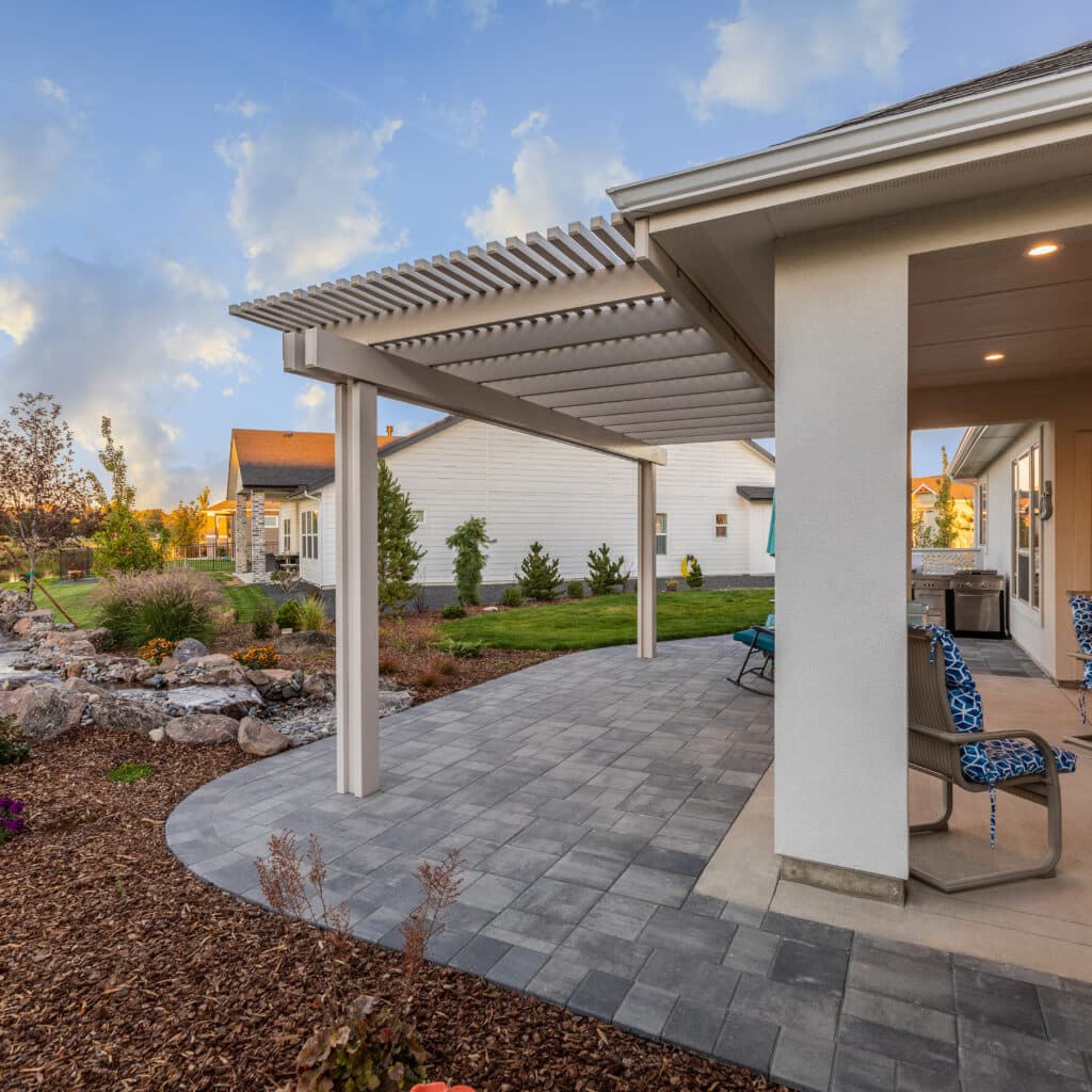 white patio cover connected to tan house in Boise, Idaho.