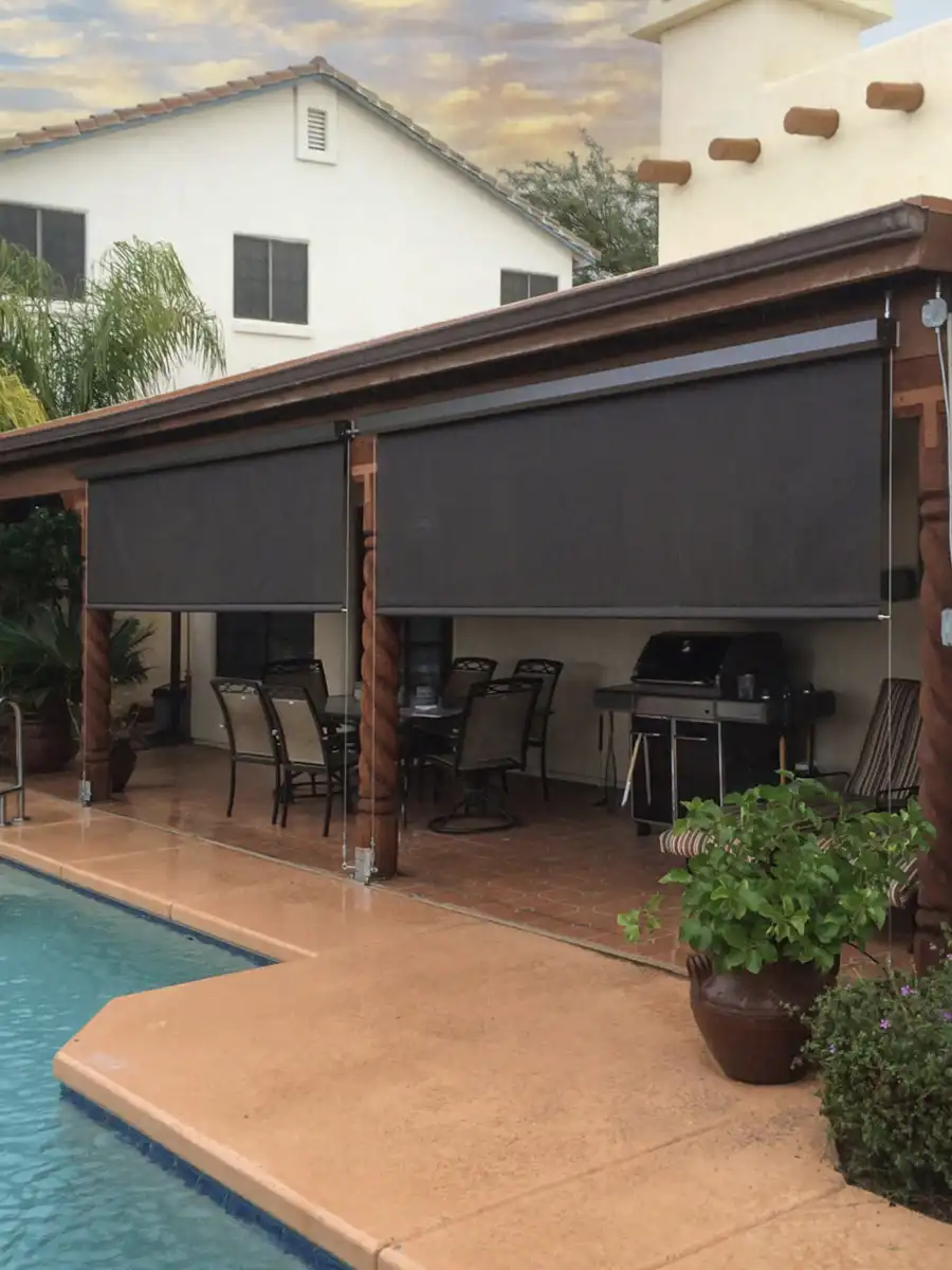 Motorized exterior patio screens offering sun protection, privacy, and weather control for outdoor patios