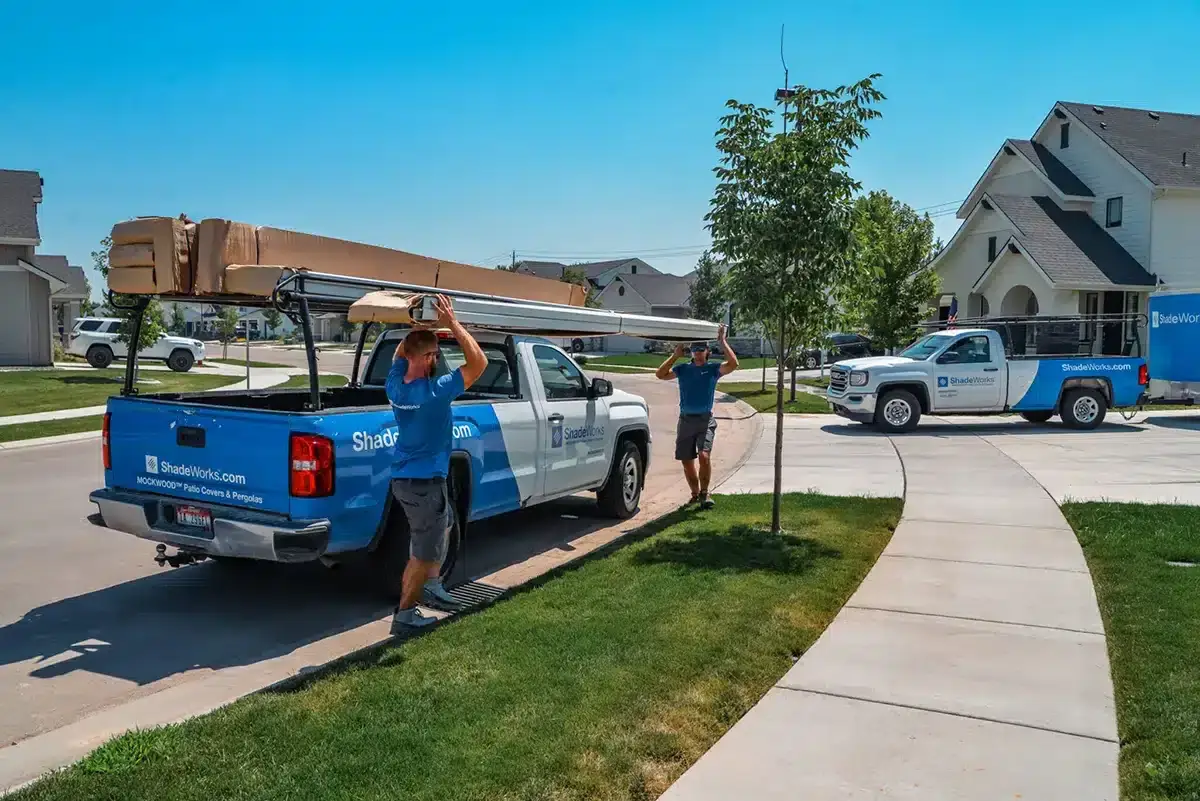 ShadeWorks installation team delivering materials for a custom patio cover installation