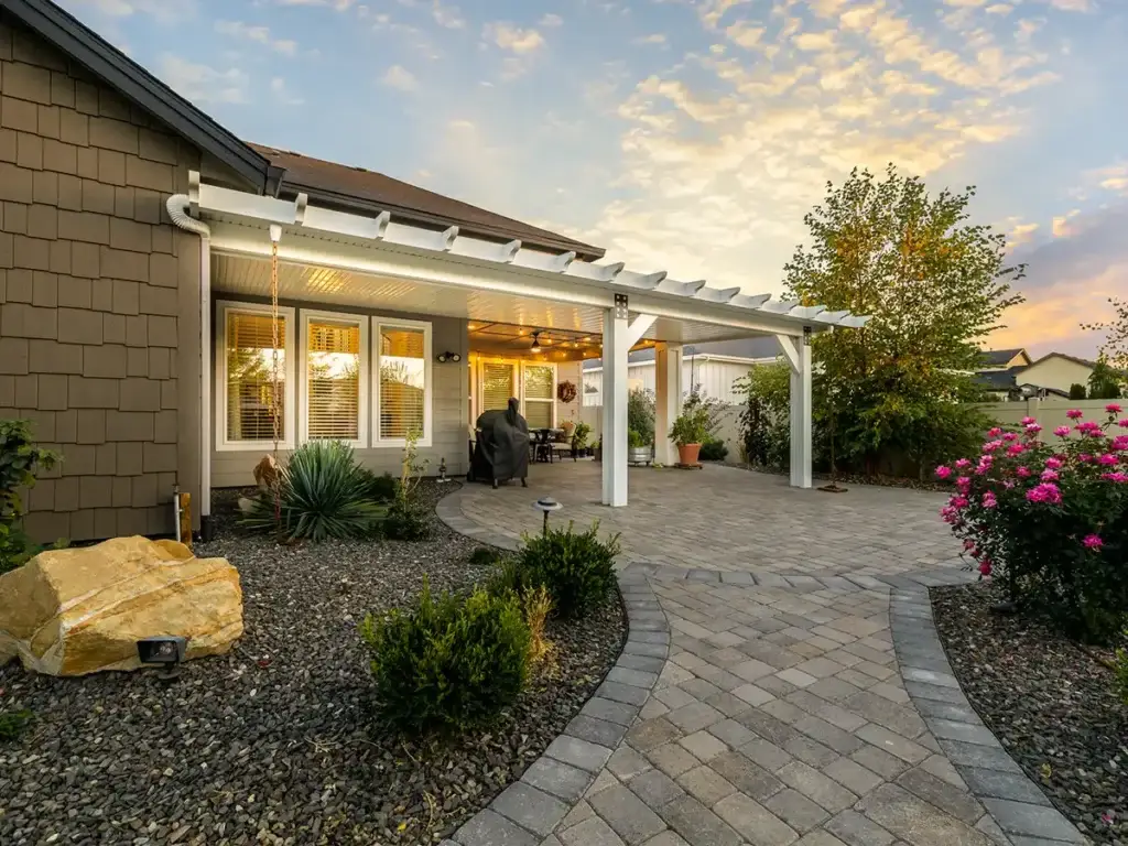 Attached patio cover connected to the home over an existing backyard patio
