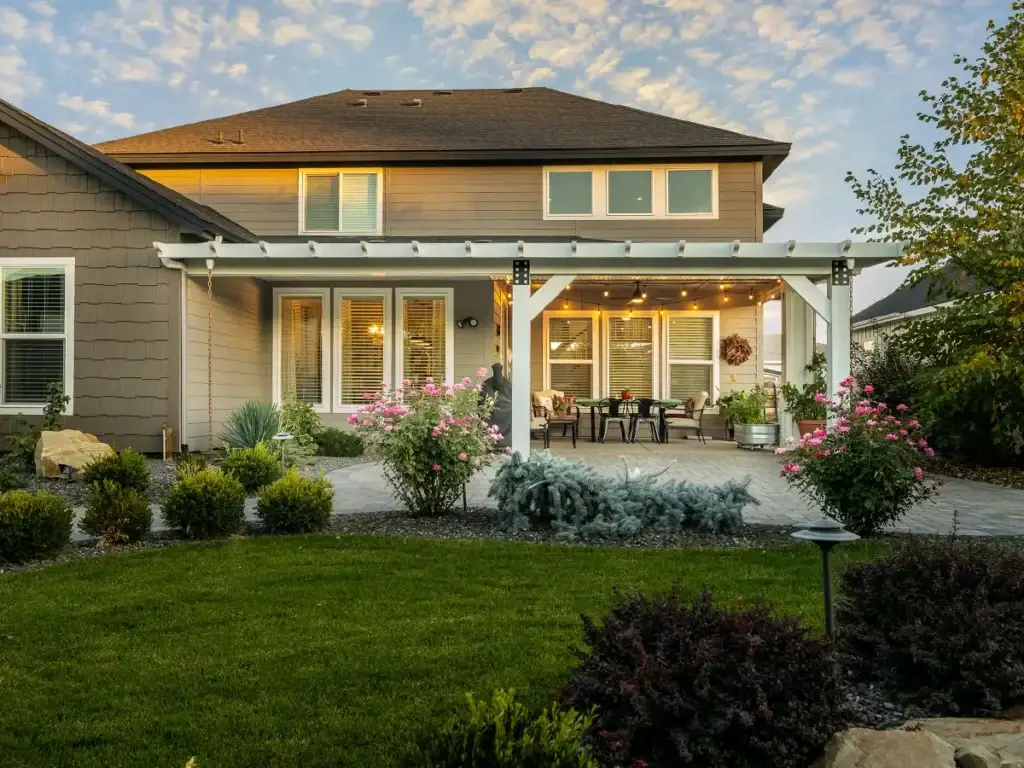 Completed patio cover project creating comfortable outdoor living space