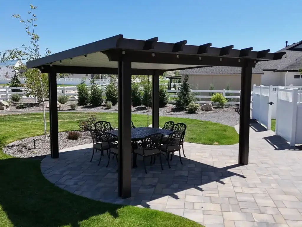 Freestanding patio cover placed over a separate backyard seating area