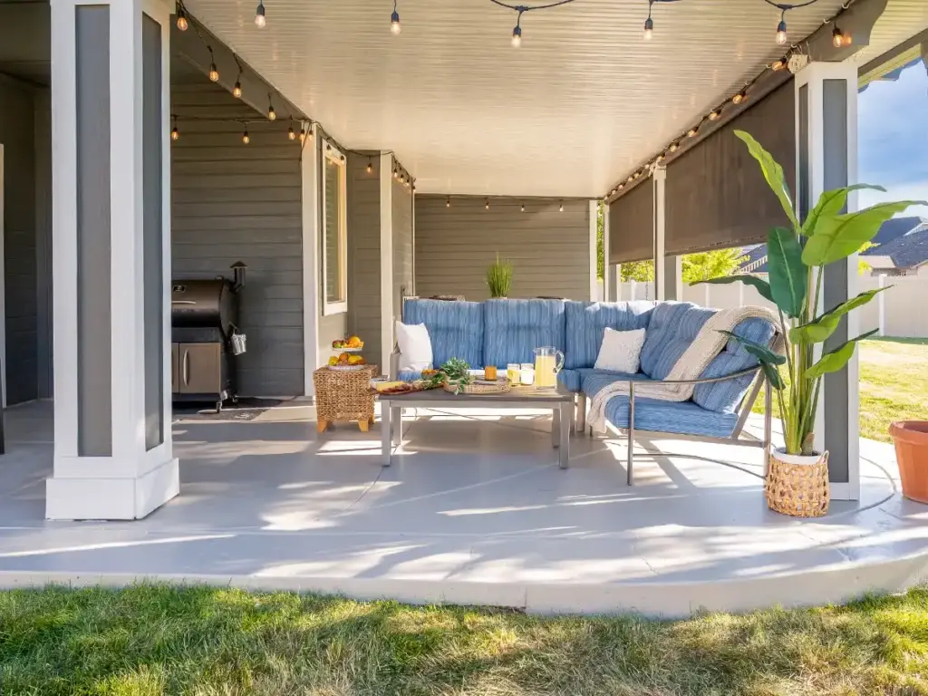 Backyard patio cover creating shade and comfort for outdoor seating
