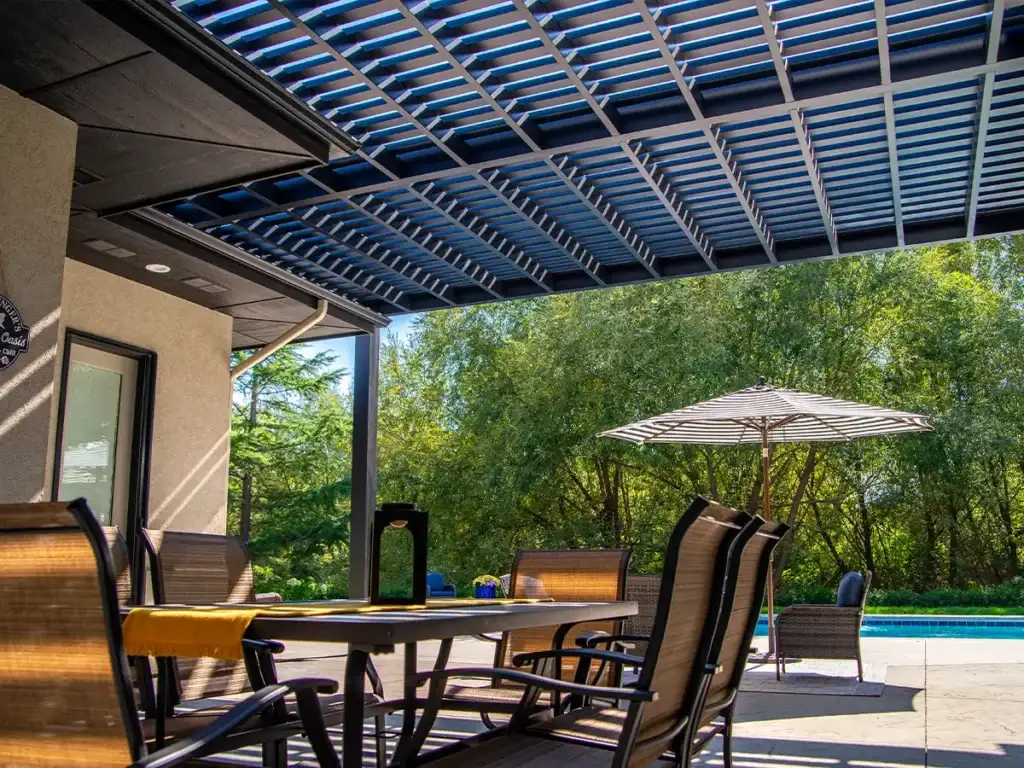 Pergola providing filtered shade and structure in a backyard living area