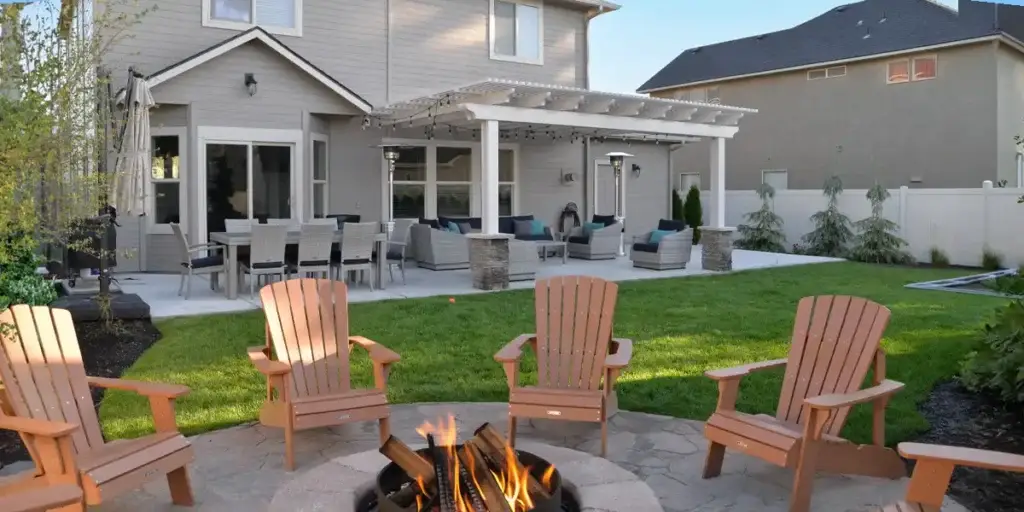 How pergolas provide shade in a residential backyard with partial sunlight and airflow