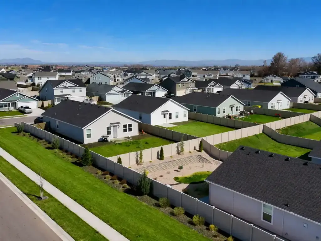 Uncovered backyard patio in direct sun showing why outdoor spaces often go unused
