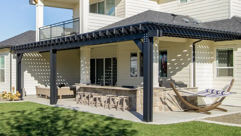 Custom aluminum pergola installed in a Las Vegas backyard for shade and outdoor living.