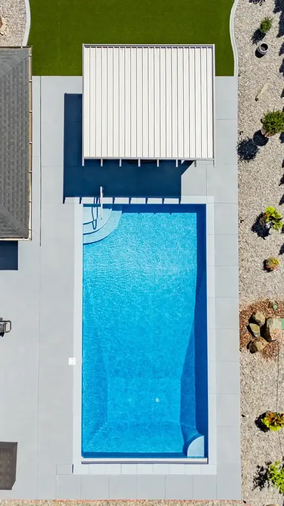 Custom aluminum patio cover overlooking a backyard pool in Las Vegas, Nevada.
