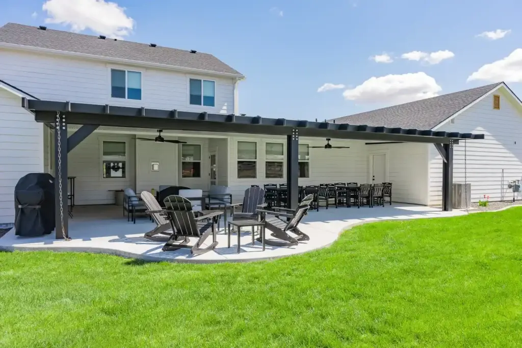 Custom insulated patio cover installed in a Boise backyard creating shade and outdoor living space