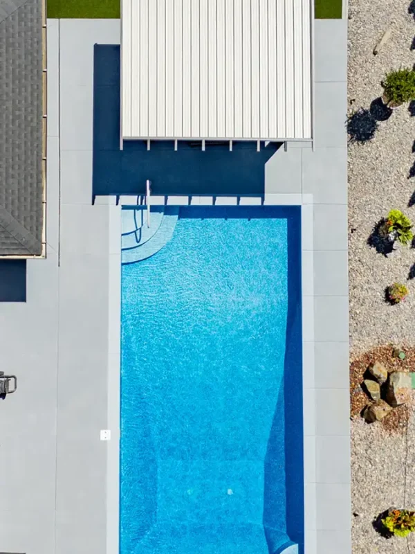 Custom aluminum patio cover overlooking a backyard pool in Las Vegas, Nevada.
