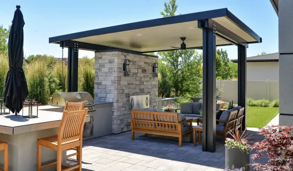 Custom aluminum patio cover creating shade over an outdoor living space in a Las Vegas backyard.