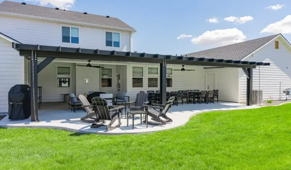 Custom insulated patio cover installed in a Boise backyard creating shade and outdoor living space