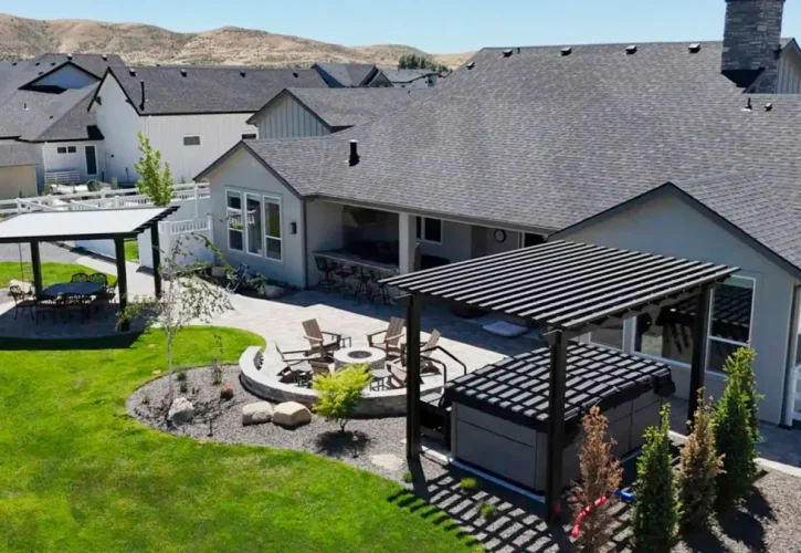 Aerial view of custom pergolas and patio covers in Treasure Valley backyard