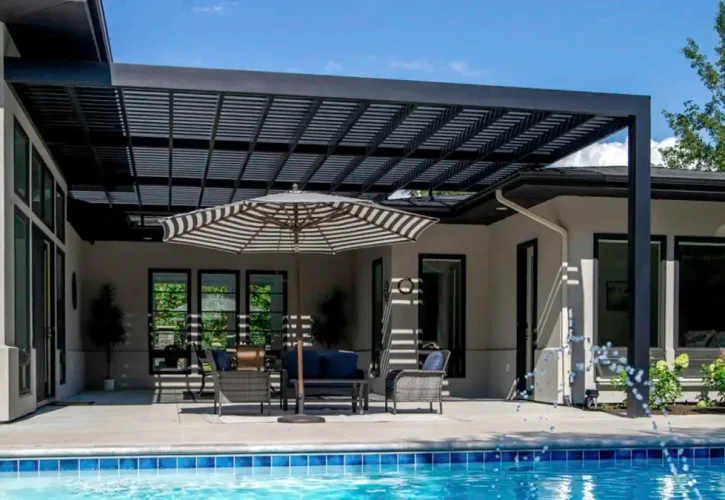 Modern black pergola beside backyard pool in Treasure Valley Idaho