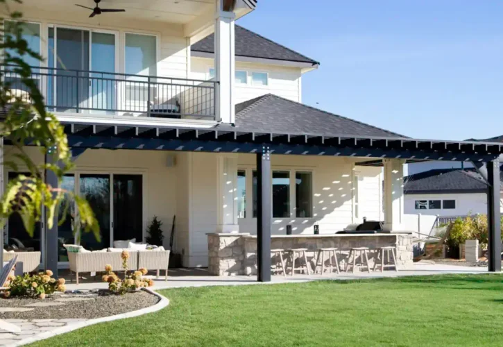 Custom aluminum pergola attached to Treasure Valley home backyard patio